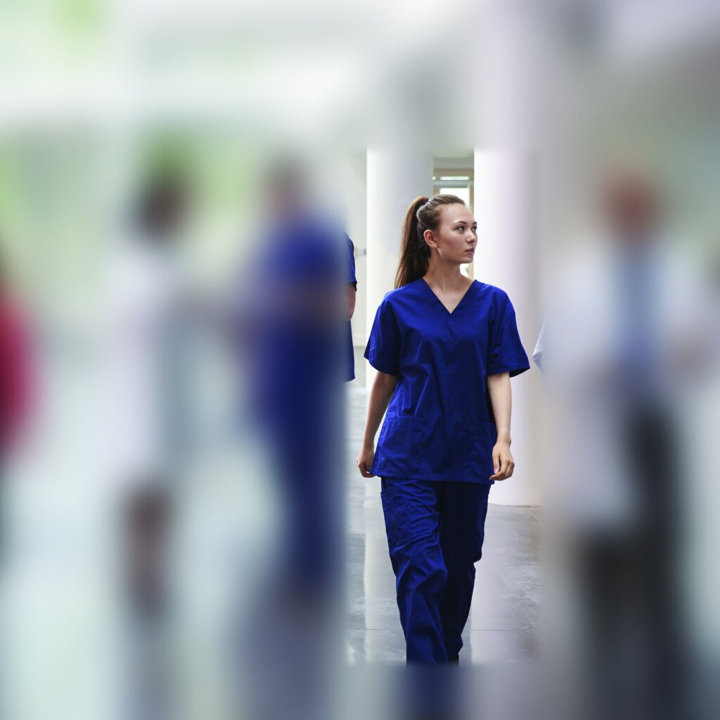 Healthcare nurse in Facit's full body blur.