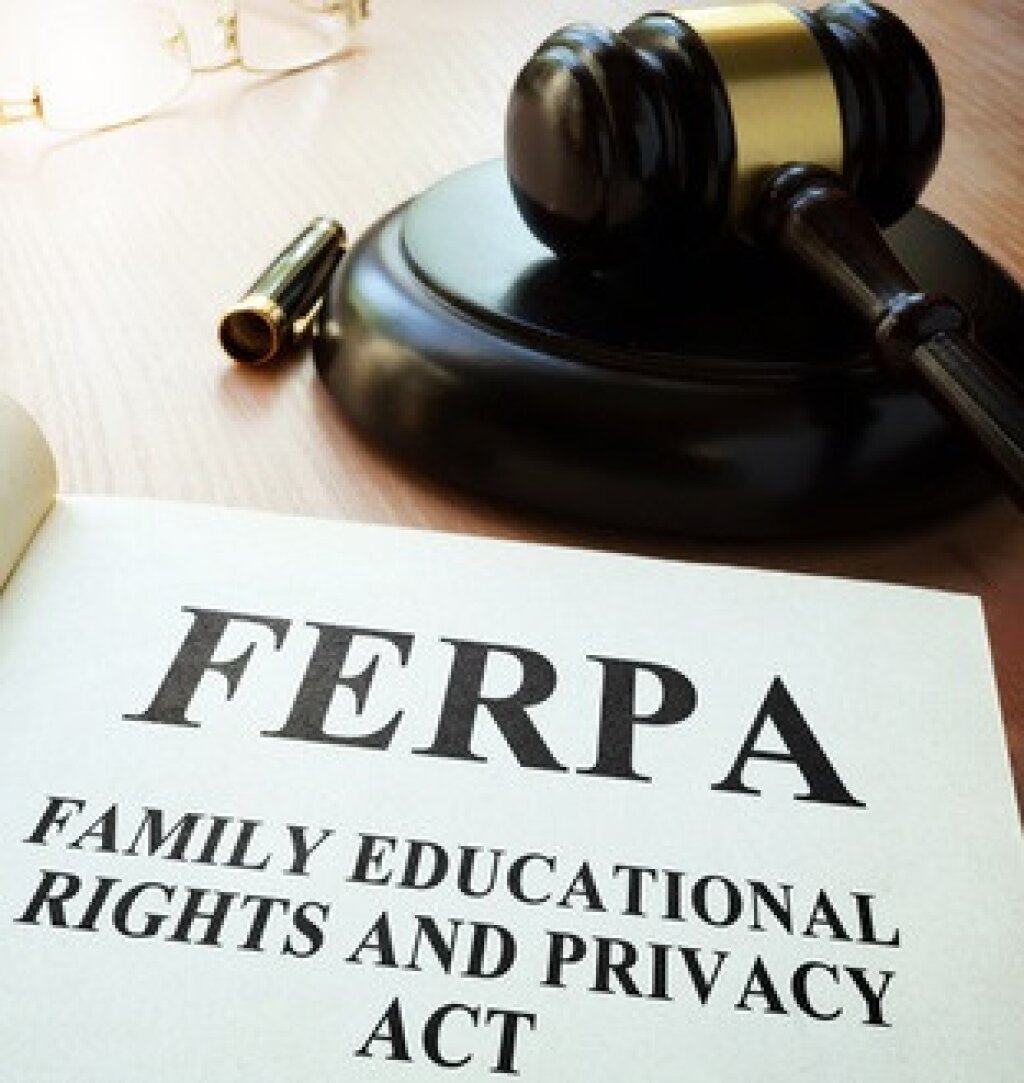 A gavel and book with FERPA written on it.
