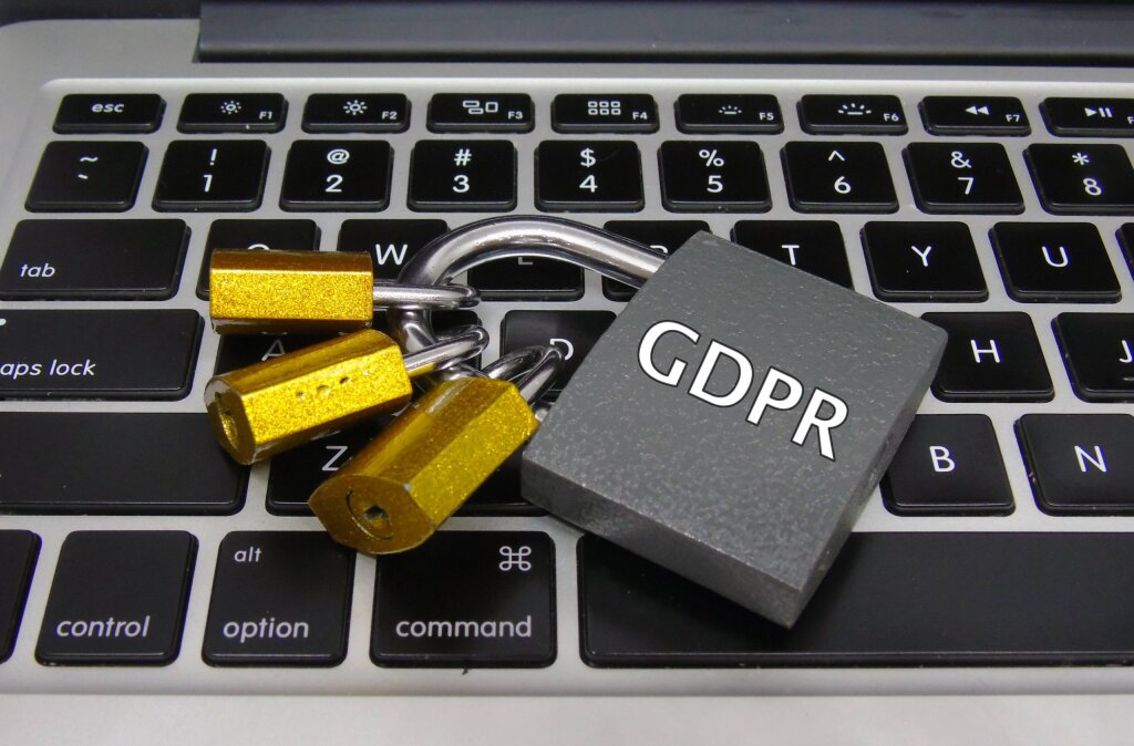 A lock labelled “GDPR” on a keyboard.