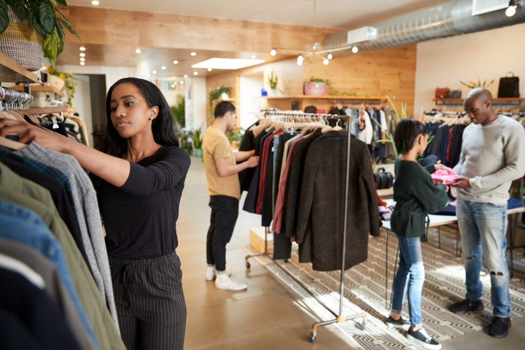 People browsing in a clothes shop.