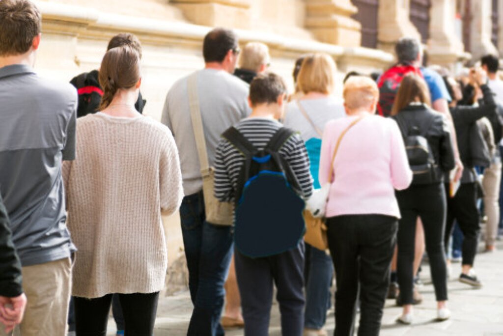 Image of a queue outdoors.