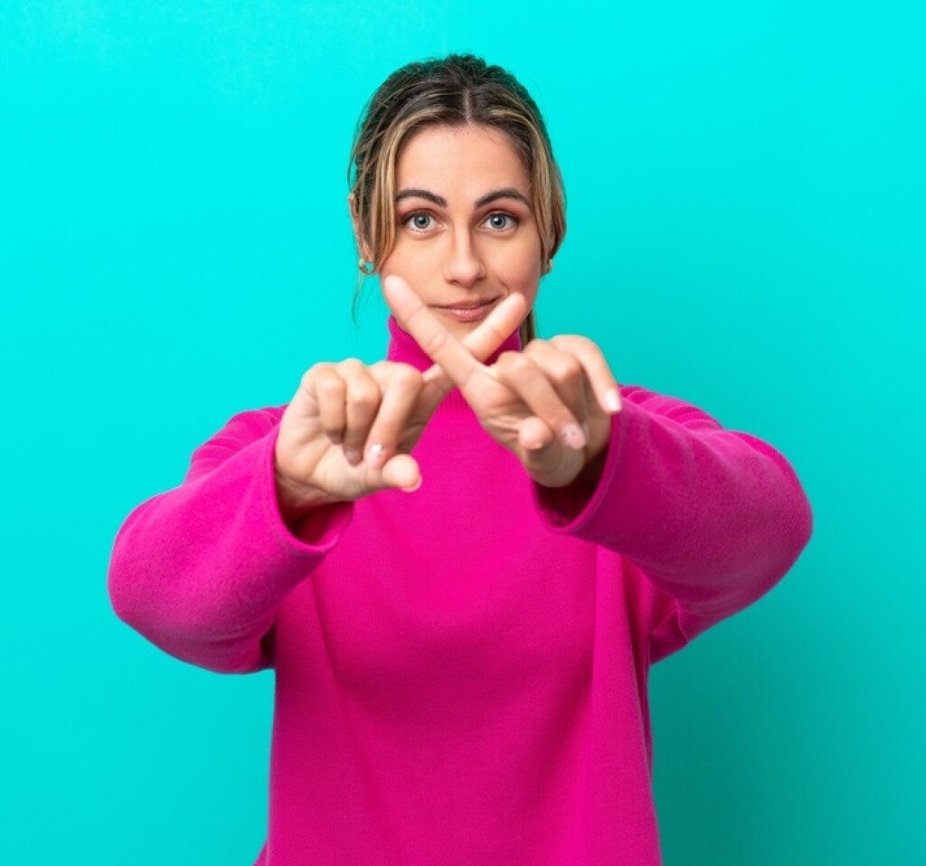 Image of lady crossing her fingers.